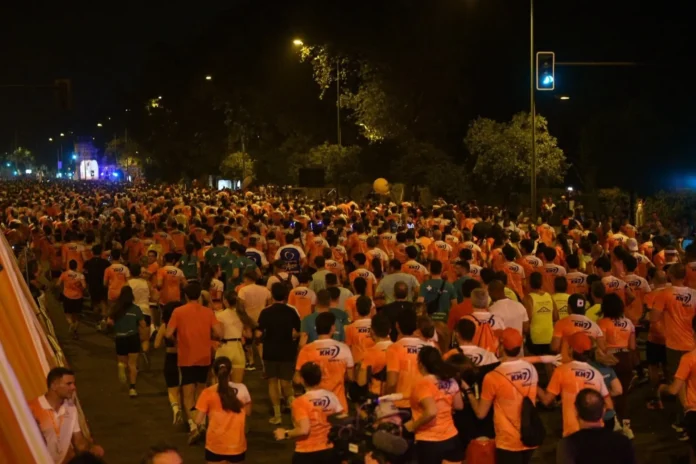 Atletismo.- La XXXVIII Carrera Nocturna del Guadalquivir KH-7 bate su récord de participación con 26.000 corredores