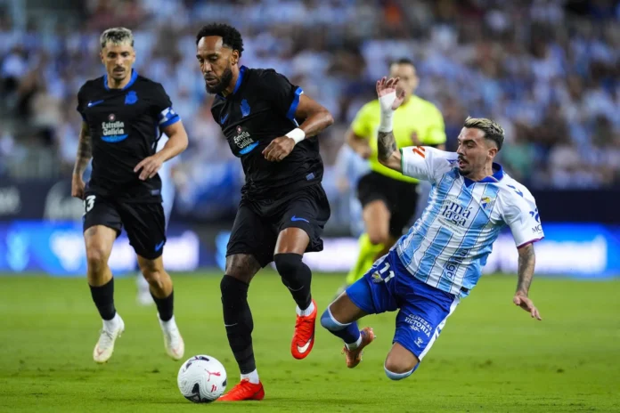 Fútbol/Primera.- (Crónica) Málaga y Deportivo empatan en La Rosaleda y Osasuna y Levante se neutralizan